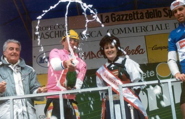 Laurent Fignon uncorks the bubbly after stage 14 of the 1989 Giro d'Italia.