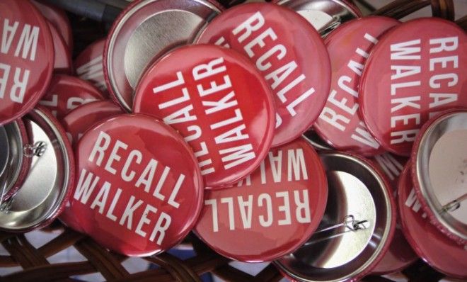 &amp;quot;Recall Walker&amp;#039; pins sit in a basket in the Rock County Democratic Party Headquarters on June 4. Wisconsin Gov. Scott Walker survived.