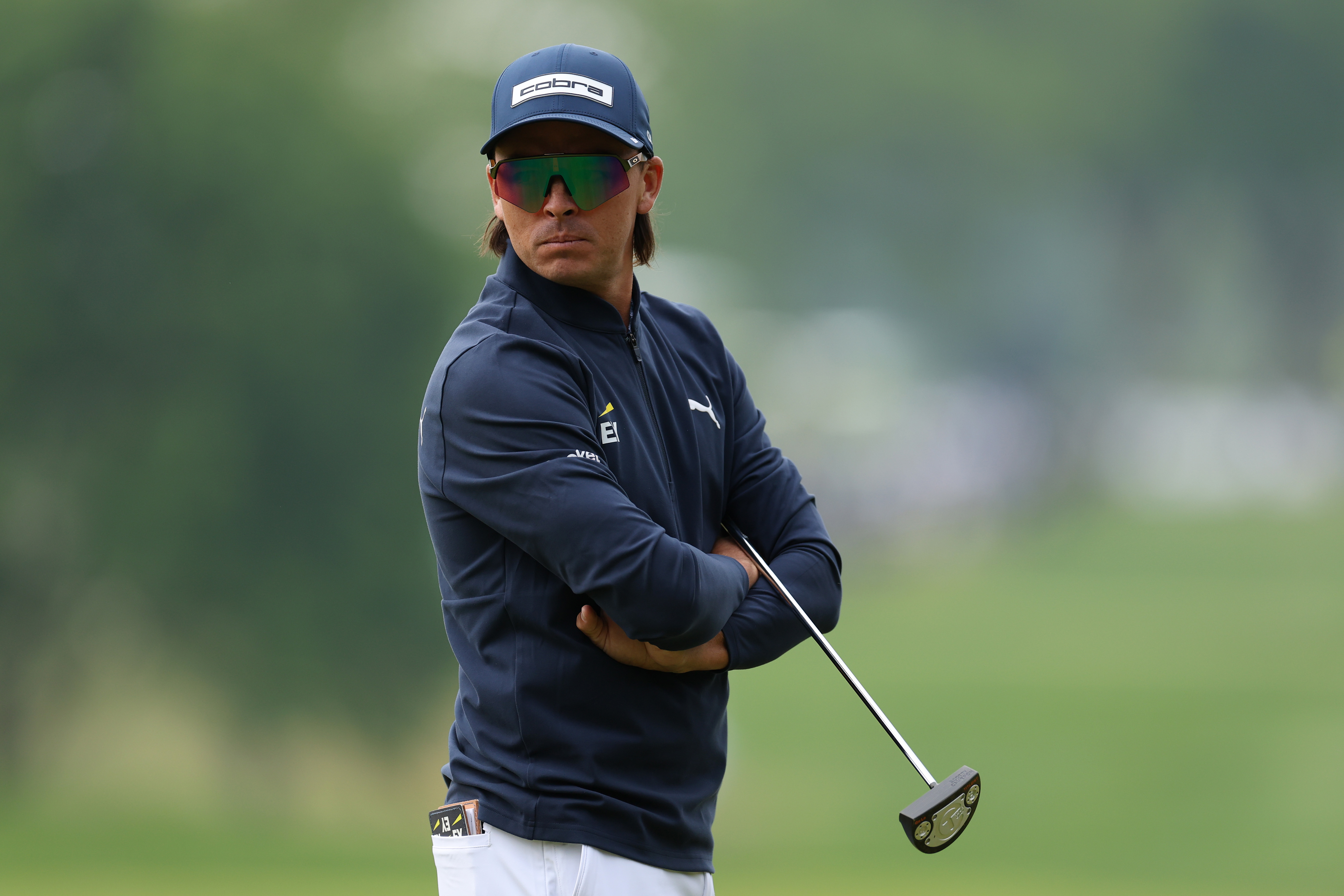 Rickie Fowler looks on from the 12th green during the first round of the PGA Championship at Aronimink Golf Club