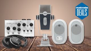 AKG studio headpones, DSM & Humboldt Amp Sim and JBL speakers surrounding an AKG Lyra USB microphone