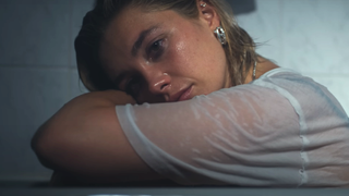 Florence Pugh in white shirt in bathtub in Youngblud music video Zombie