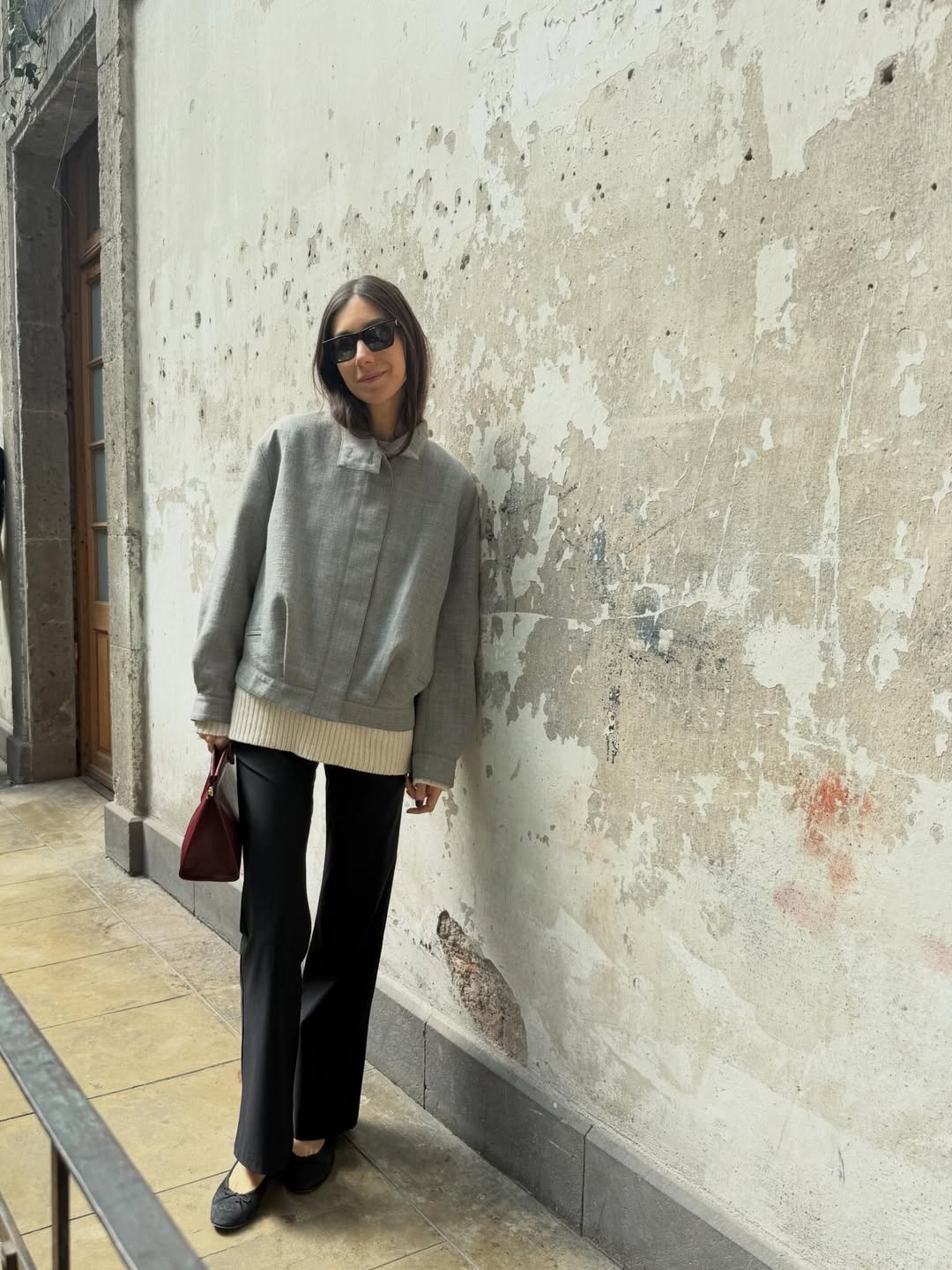 Melanie Masarin wearing ballet flats.