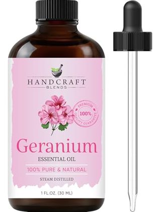 Geranium Essential Oil in an amber glass bottle with pipette lid