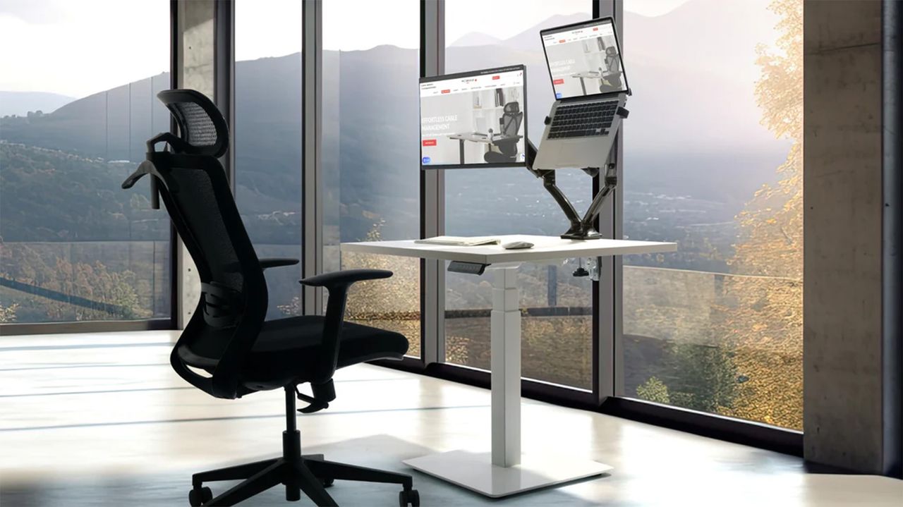 Progressive desk with monitor and laptop