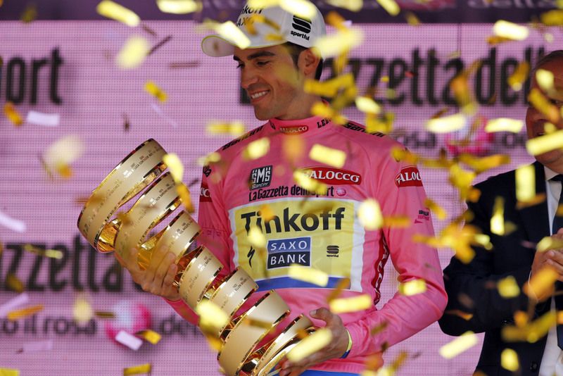 Alberto Contador looks fondly on his winner trophy
