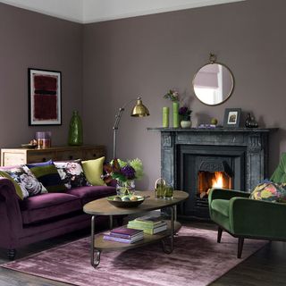 living room with grey wall and fireplace