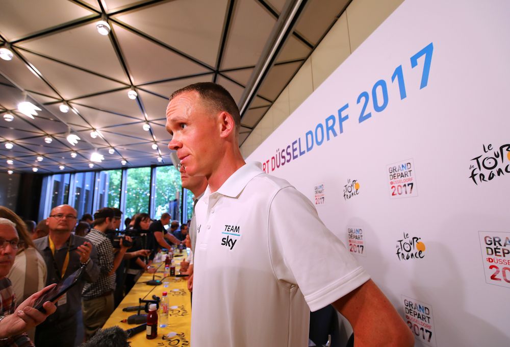 Chris Froome talks with members of the media at Team Sky's pre-Tour press conference
