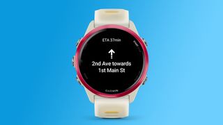 A Garmin Forerunner 570 smartwatch showing directions from Google Maps.