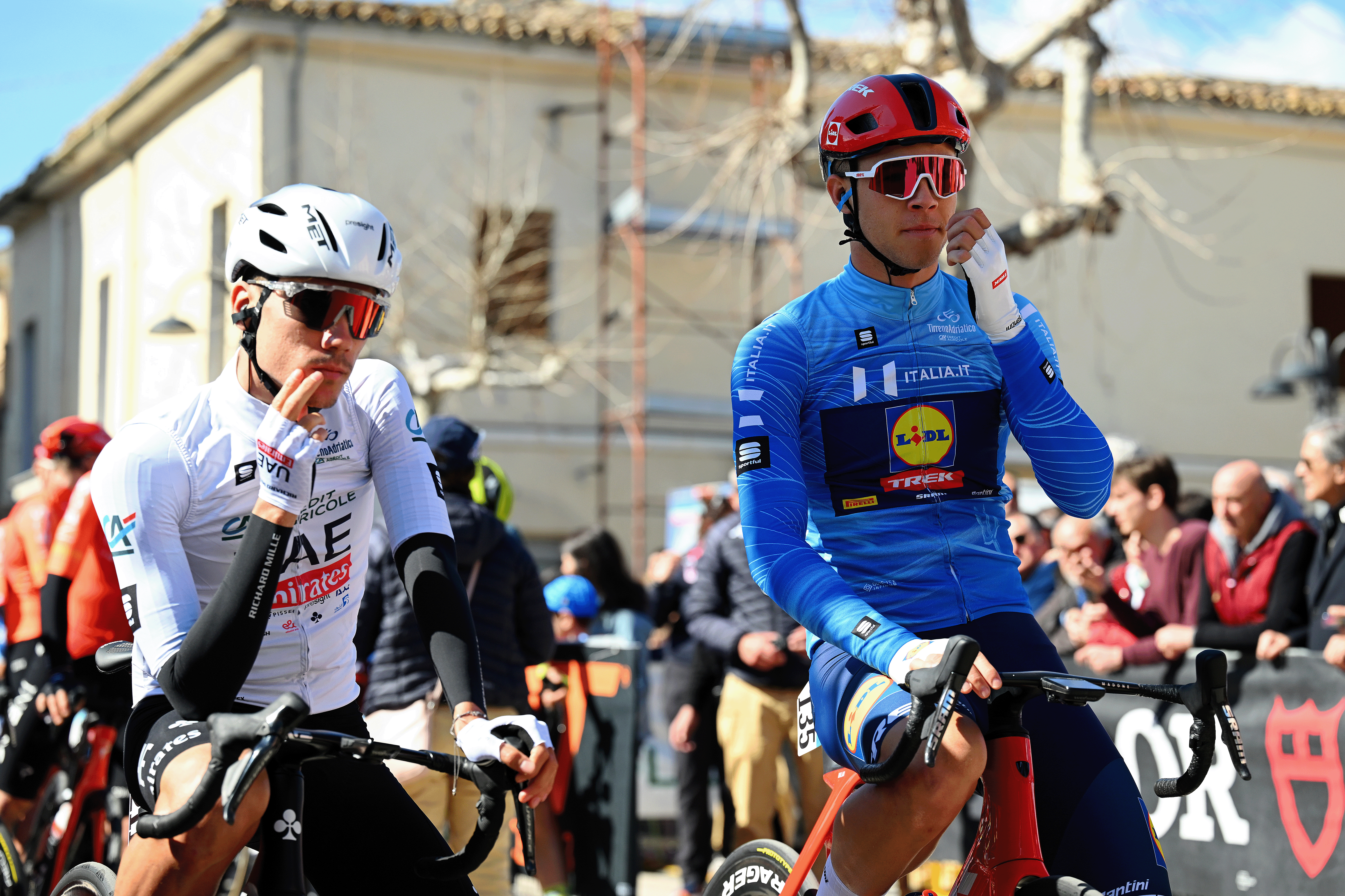 TORRICELLA SICURA, ITALY - MARCH 08: (L-R) Juan Ayuso of Spain and UAE Emirates Team - White best young jersey and Jonathan Milan of Italy and Team Lidl-Trek - Blue Leader Jersey prior to the 59th Tirreno-Adriatico 2024 – Stage 5 a 144km stage from Torricella Sicura to Valle Castellana 615m / #UCIWT / on March 08, 2024 in Torricella Sicura, Italy. (Photo by Tim de Waele/Getty Images)