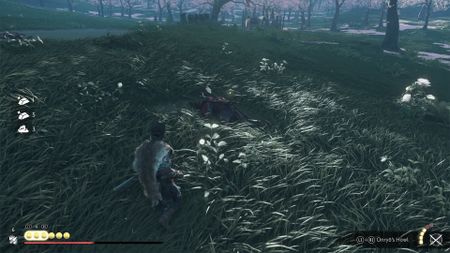 Ghost of Yotei screenshot of Atsu looting an enemy for materials