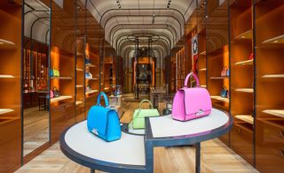 Moynat’s sparkling new boutique features an arched, double height ceiling