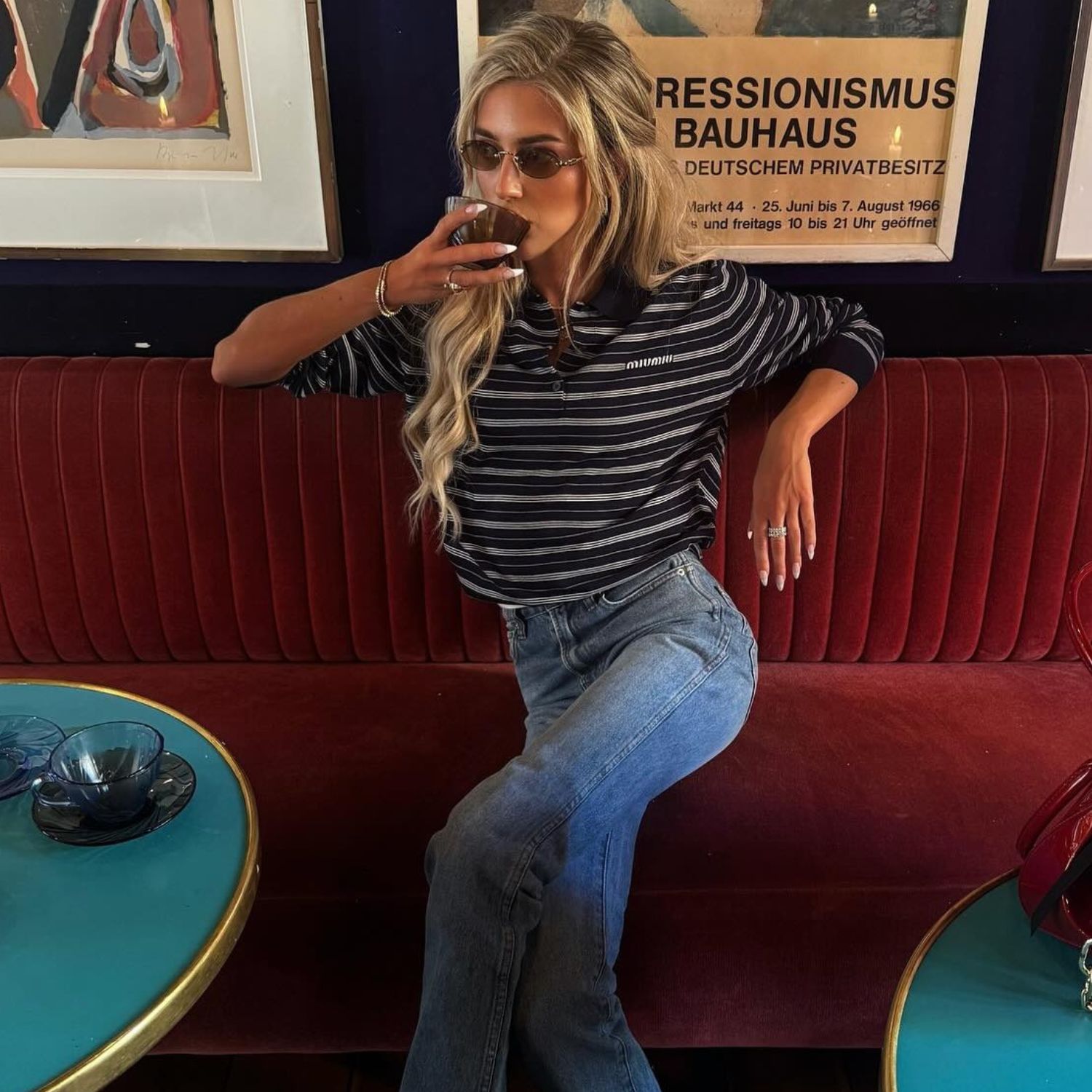 @emilisindlev showing how to style ballet flats with cigarette jeans