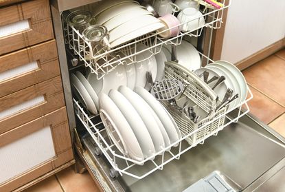 Dishwasher in kitchen with clean dishes