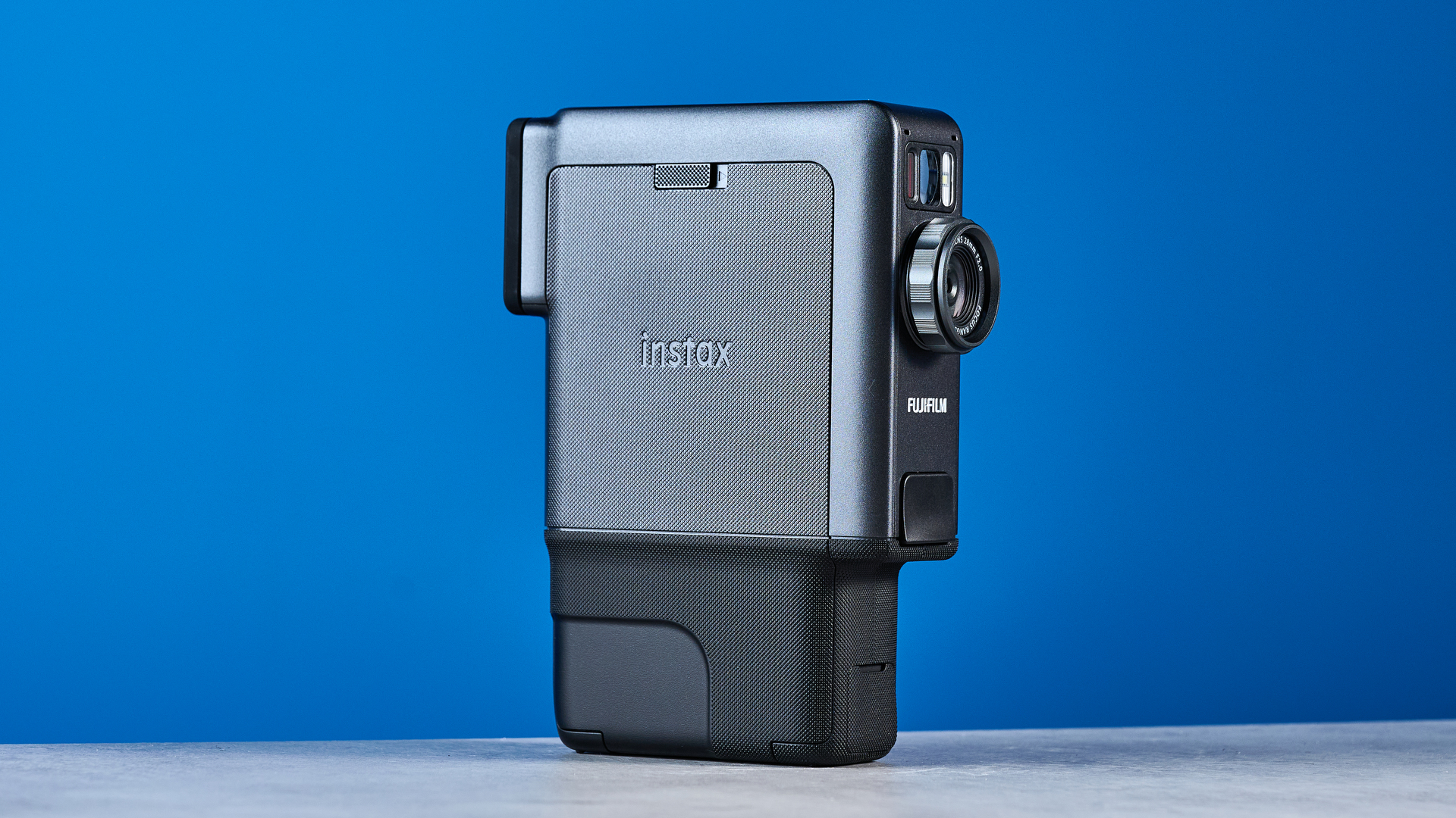 A Fujifilm Instax mini Evo Cinema hybrid instant camera