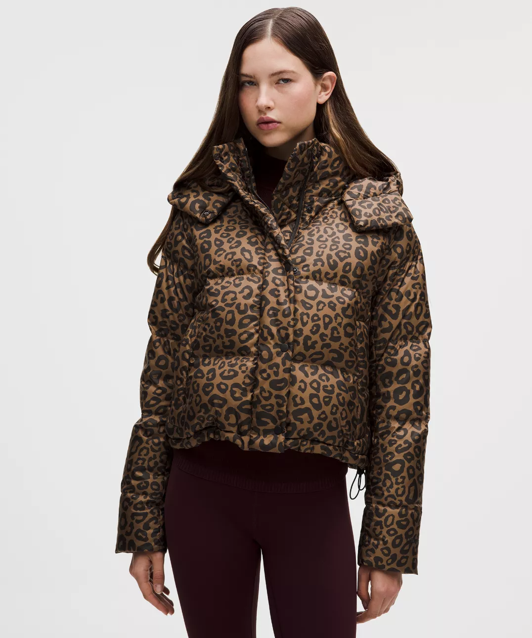 a model wearing a leopard print lululemon ski jacket