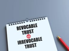 pencil and book with the words Irrevocable Trust vs Revocable Trust
