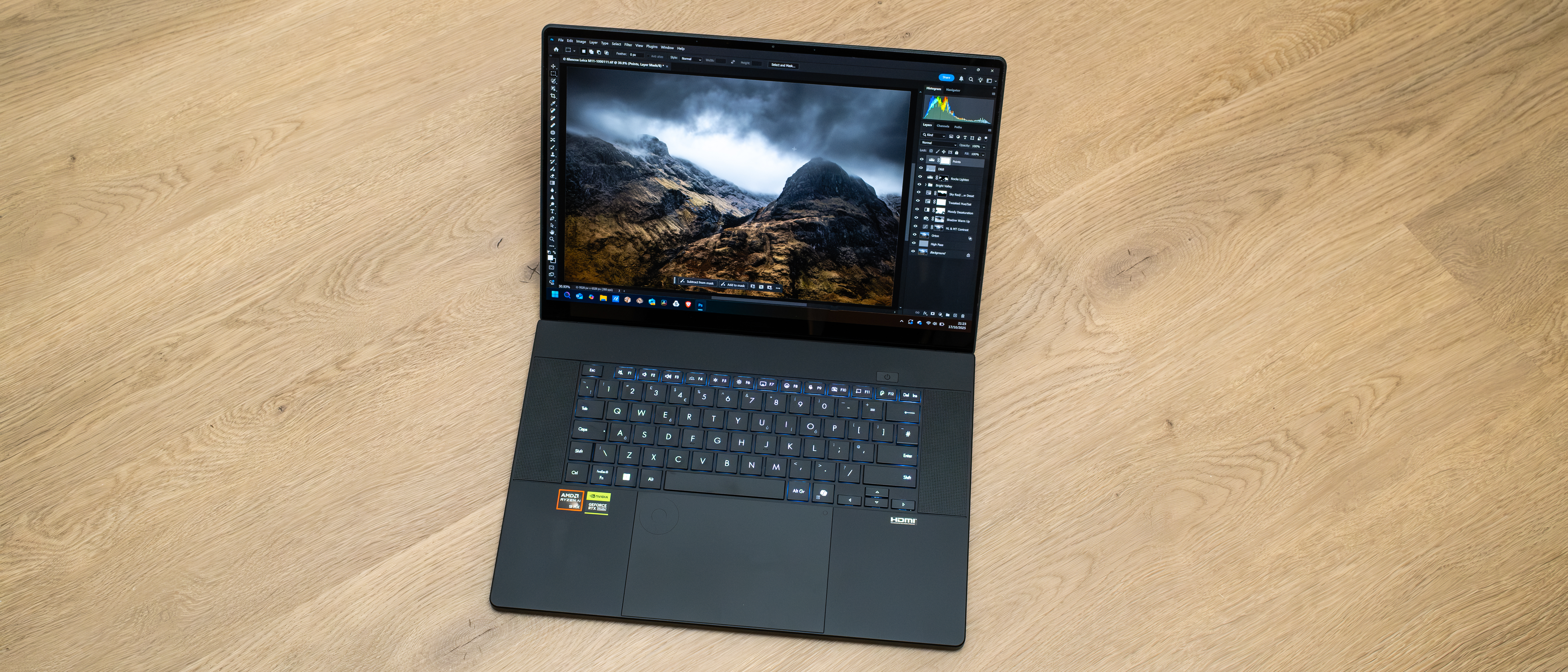 Asus ProArt P16 H7606WX on a wooden floor