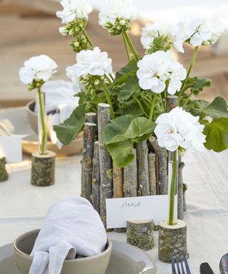 outdoor table setting with white flowers