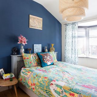 guest bedroom with colorful bedding