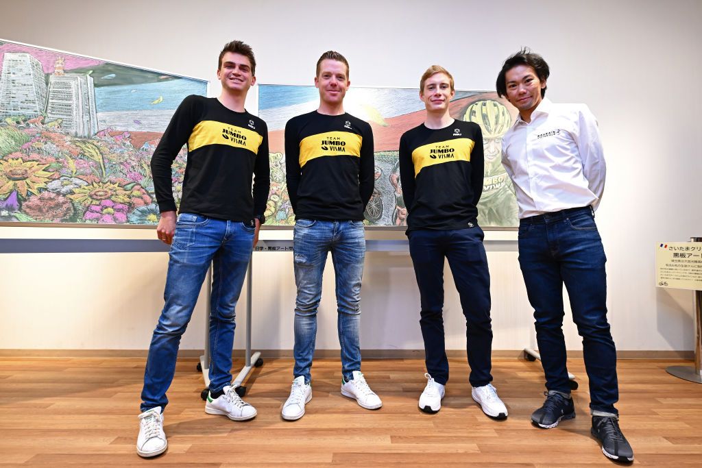 SAITAMA JAPAN NOVEMBER 05 LR Sepp Kuss of United States Steven Kruijswijk of The Netherlands Jonas Vingegaard Rasmussen of Denmark and Team Jumbo Visma Yellow Leader Jersey and Yukiya Arashiro of Japan and Team Bahrain Victorious Special Team Japan for Saitama attend to a bicycle culture and art exhibition during the 8th Tour de France Saitama Criterium 2022 Media Day SaitamaCriterium on November 05 2022 in Saitama Japan Photo by Kenta HaradaGetty Images