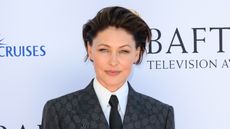 Emma Willis posing on the BAFTA red carpet in tailoring