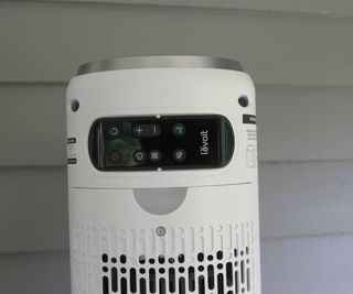 The carry handle and remote storage of the Levoit 36 Inch Tower Fan