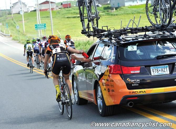 Joelle Numainville (Optum p/b Kelly Benefits Strategies) takes on supplies from the team car