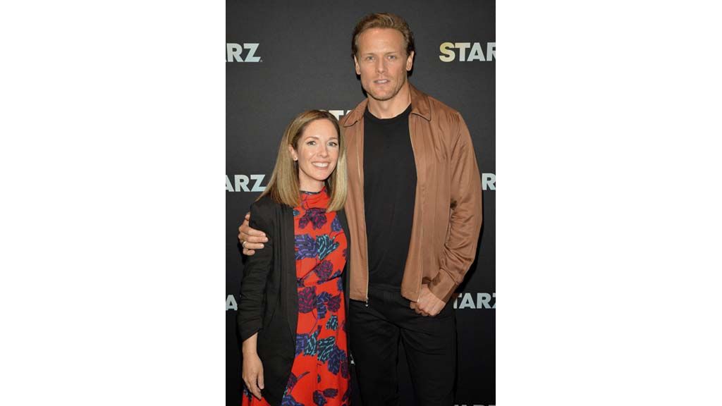 (From l.): Alison Hoffman, president, domestic networks, Starz, and Sam Heughan of Outlander at the Starz Summer TCA Press Tour presentation in Pasadena, California.