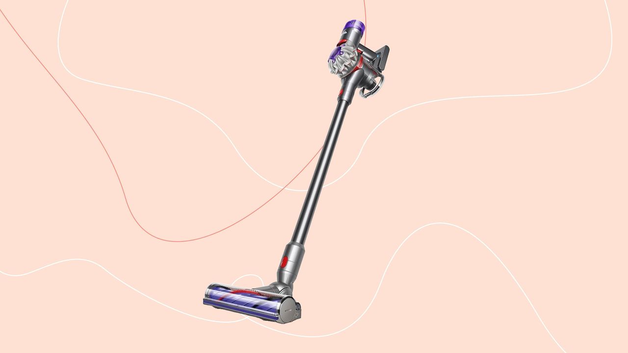 Dyson V8 Advanced cut out on a pink background