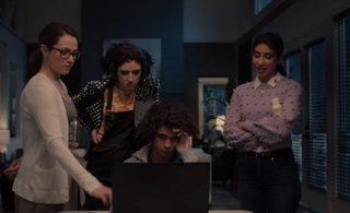 The Imperfects season 2: cast looking at a laptop
