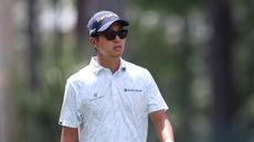 Michael Kim from the torso up while walking during the RBC Heritage
