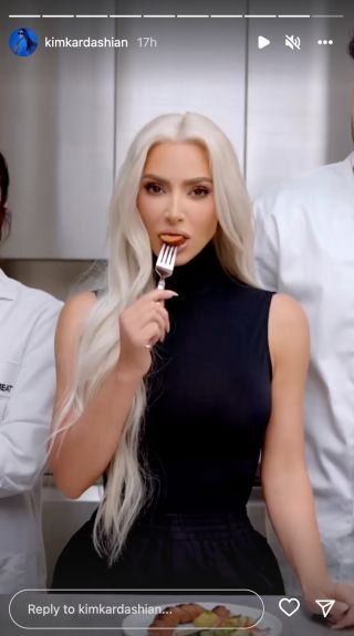 Kim Kardashian eating sausage