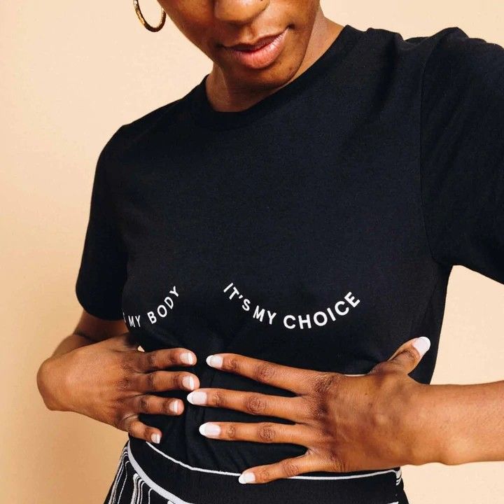 black feminist tee shirt that says "it's my body, it's my choice"