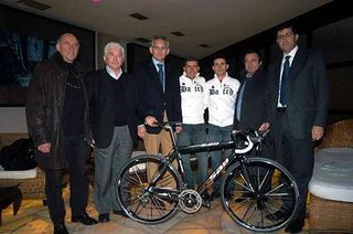 Management and a team bike