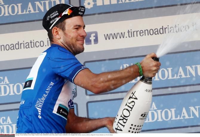 Cavendish enjoying the podium champagne