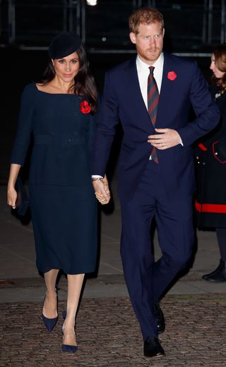 Meghan, Duchess of Sussex and Prince Harry, Duke of Sussex attend a service to mark the centenary of the Armistice at Westminster Abbey on November 11, 2018 in London, England