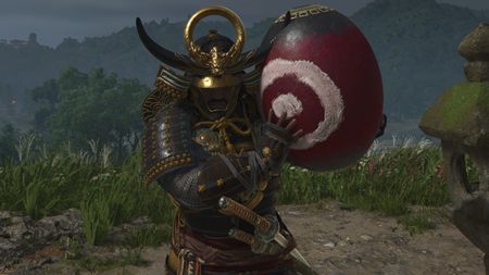 Assassin's Creed Shadows Makino Kurumazuka Kofun - Yasuke holding a large red explosive jar.