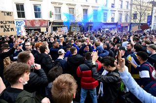 Chelsea fans protest against the Super League outside Stamford Bridge on April 20