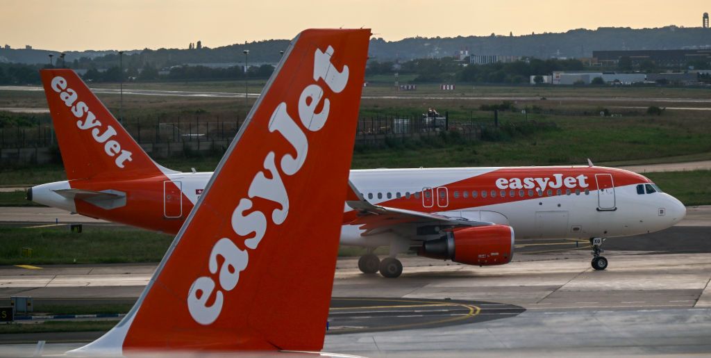 EasyJet aircraft cross each other while one of them taxies for take off at Orly International Airport on September 10, 2023 in Paris, France