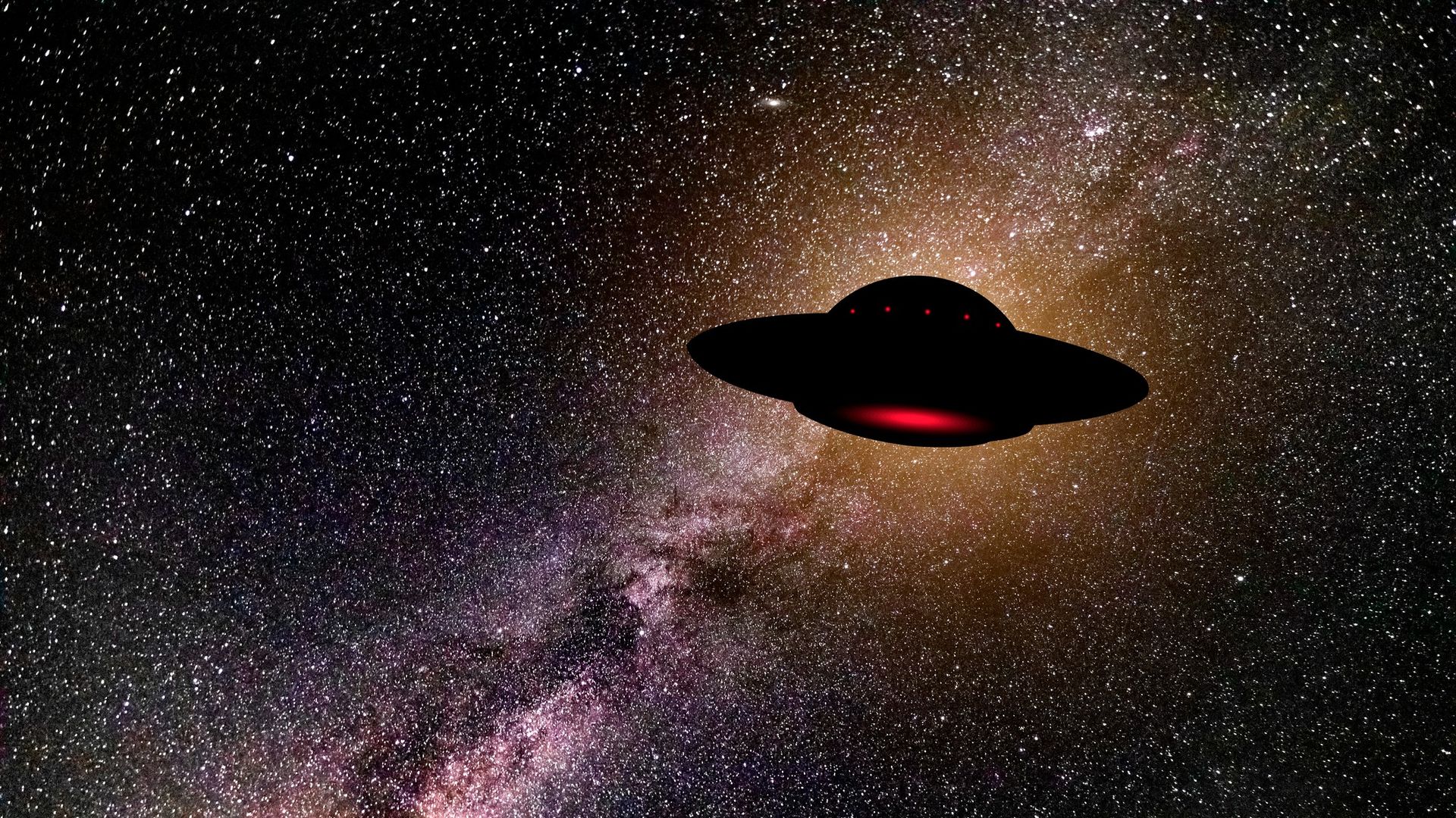 An illustration of a flying saucer looking pitch-black against the starry n...