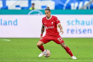 Kostas Tsimikas of Liverpool FC controls the Ball during the pre-season friendly match between Karlsruher SC and Liverpool FC at BBBank Wildpark on July 19, 2023 in Karlsruhe, Germany. (Photo by Harry Langer/DeFodi Images via Getty Images)