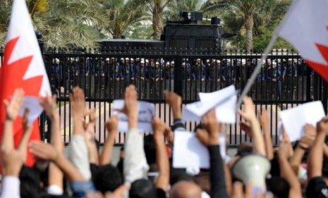 Bahrainis protest during an opposition rally in front of a heavily guarded cabinet house in the capital.