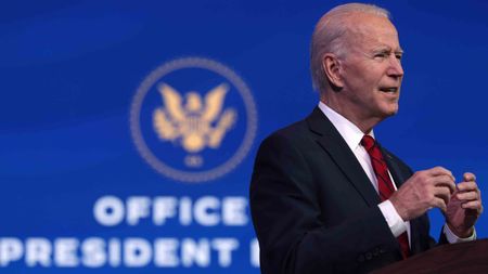 President Joe Biden at podium speaking