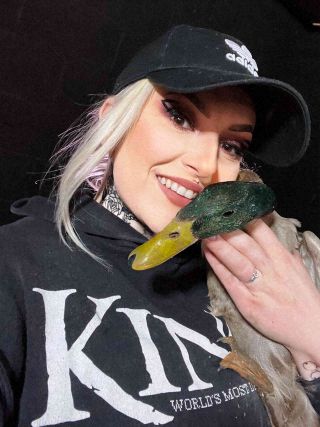 Megan Targett of Vexed with her pet duck Quacky