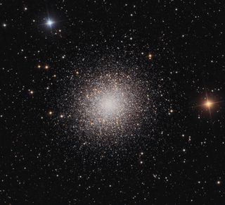 The globular cluster M13, located in the constellation Hercules, contains more than 100,000 stars.