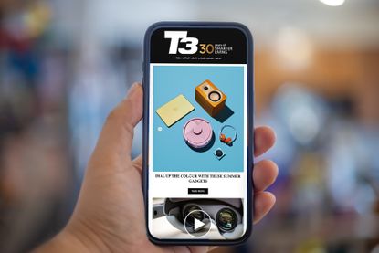iPhone with T3 Newsletter on screen