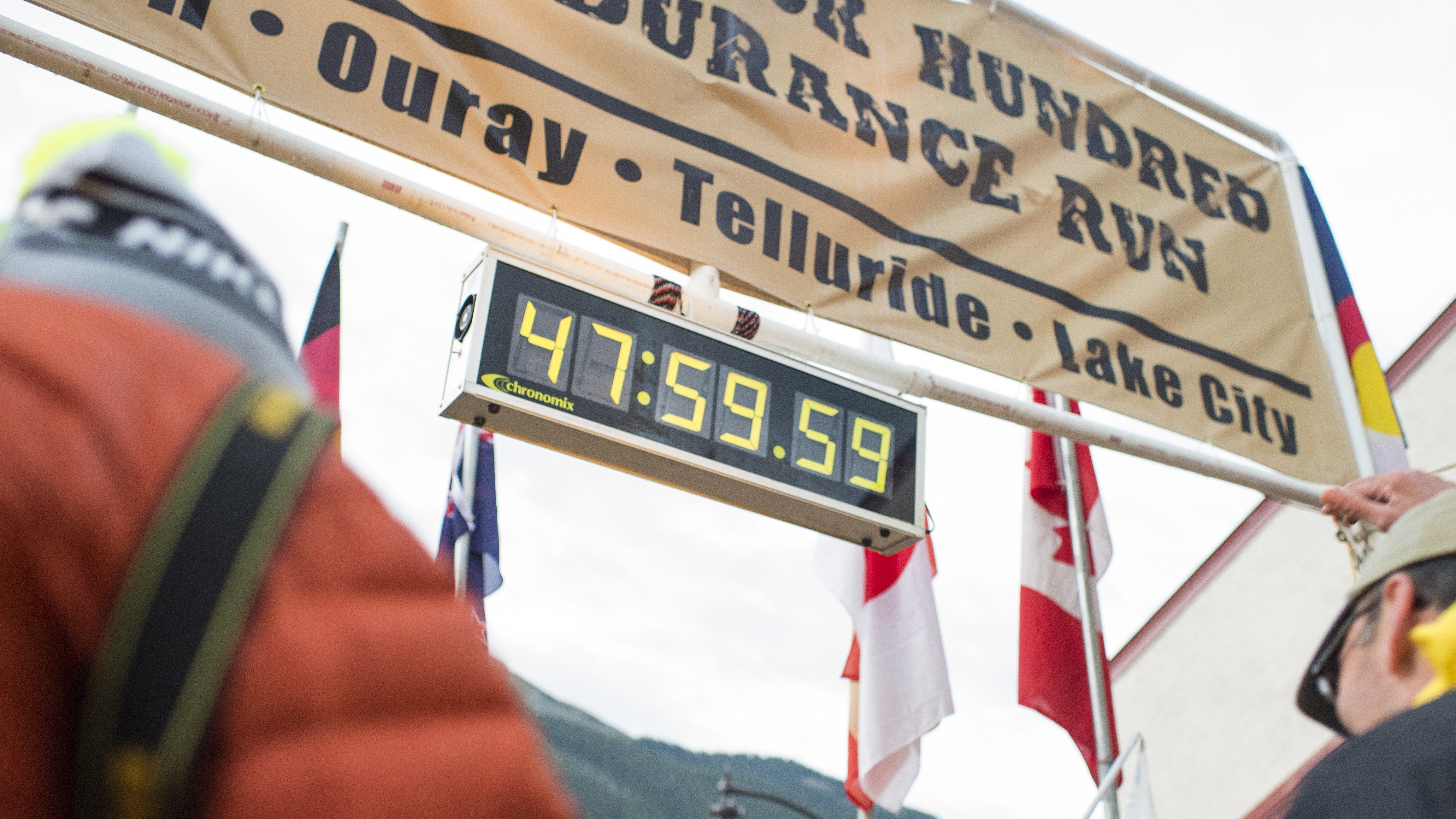 The finishing clock of the Hardrock 100 endurance run outside the Silverton High School gymnasium shows the time of Bogie Dumitrescu of Boulder on July 12, 2015, in Silverton, Colorado