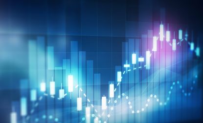 closeup of stock market chart with white bars and blue volume bars