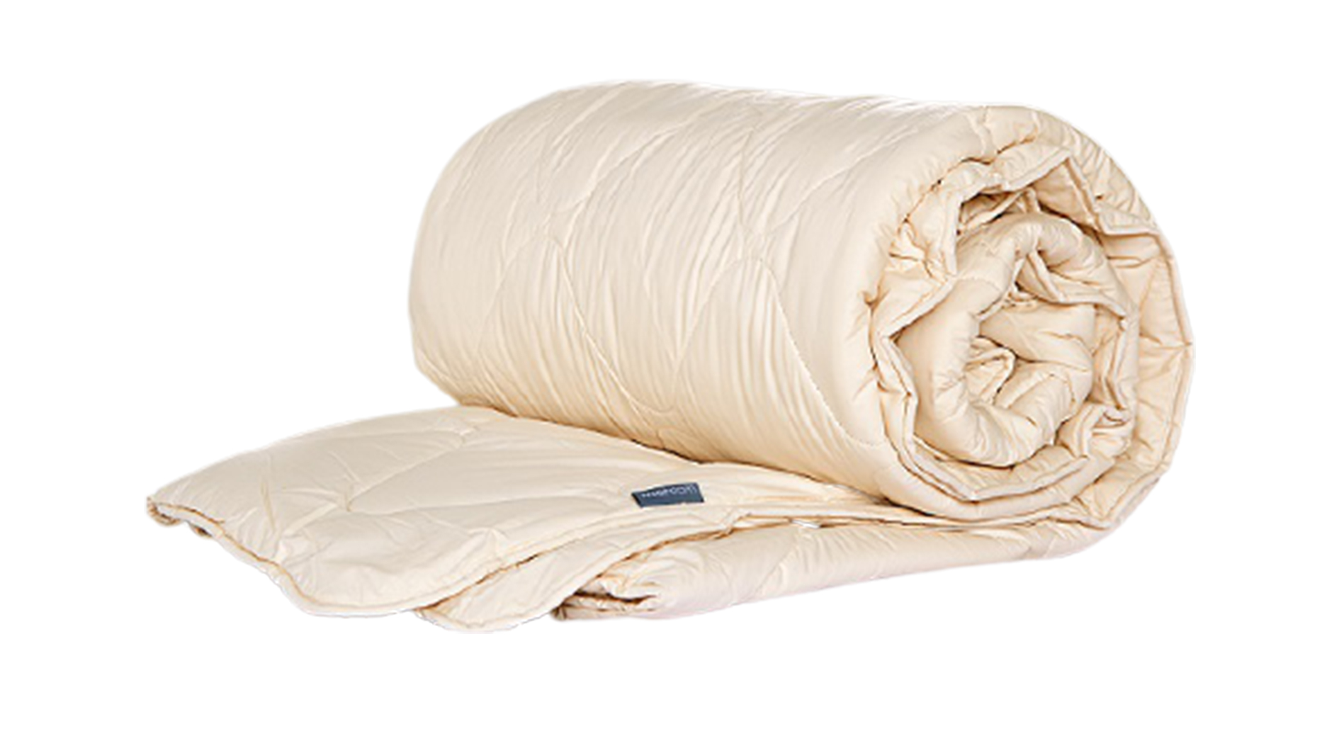 Best duvets: The WoolRoom Deluxe Washable Duvet shown rolled up neatly