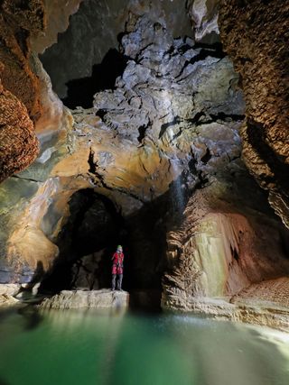 Photograph titled Gracie Sharp Los Gours down Coventosa Cave Cantabria Spain. Photographed by Sam Davis